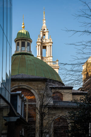 The east end of Christopher Wren's church behind the Mansion House seen from the terrace to New Court Rothschild Bank in the City of London. (Jan22)