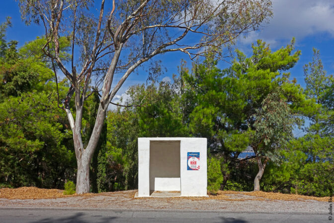 A nicely painted bus shelter with a nicely positioned political fly post on it. (Sept15)