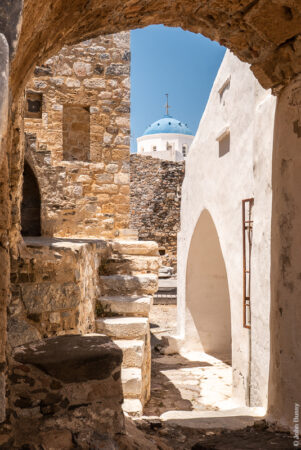 View from a reconstructed part of the once inhabited walls, beside Aghios Georghios, towards Panaghia tou Kastro (Our Lady of the Castle). (Jun22)