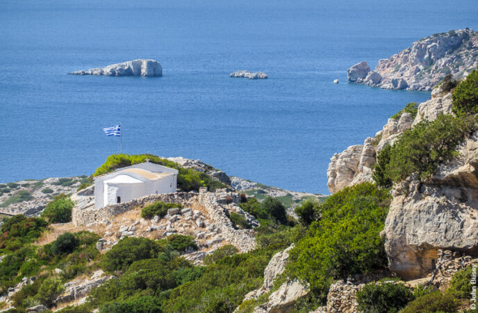 The ancient Acropolis and the church of Aghios Giorgios stand high over Fourni Town. This is a view from above them. (Oct24)