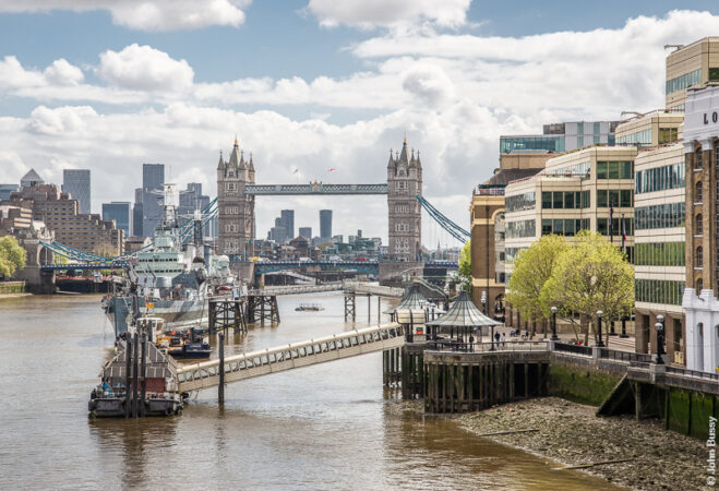 The Thames between London Bridge and Tower Bridge is called the Pool of London from when it was a centre of trading activity. Now it is dominated by HMS Belfast and London Bridge City Pier. (May21)